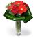 Carmen. A delicate and stylish arrangement of red gerberas and roses in a vase.. Barcelona