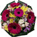 Rumba. Tight, rich round bouquet of gerbera daisies, spray roses, chrysanthemums and alstroemerias.. Barcelona