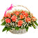 Poetry of feelings. Beautifully decorated basket of pink roses with assorted greens.. Barcelona